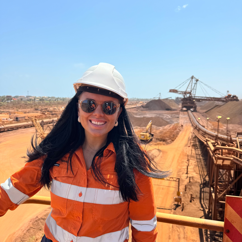 Tegan on site in hi-vis and hard hat